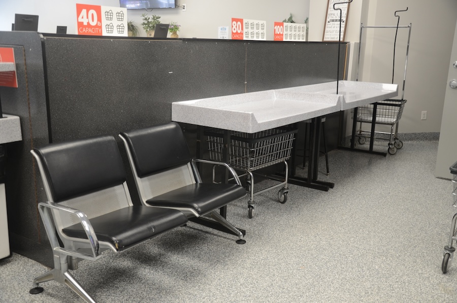 Waiting area with chairs and table